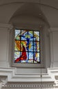 CheÃâm, Poland, 25 September 2020: Stained glass window in the window of the church, the shrine of the Mother of God in CheÃâm in